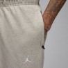 Nike Pantaloni Con Polsino Logo Dri Fit Grigio Uomo